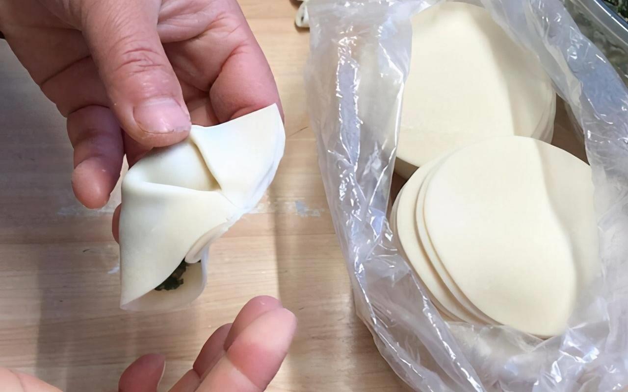 包饺子的手法教程(包饺子的最简单手法)