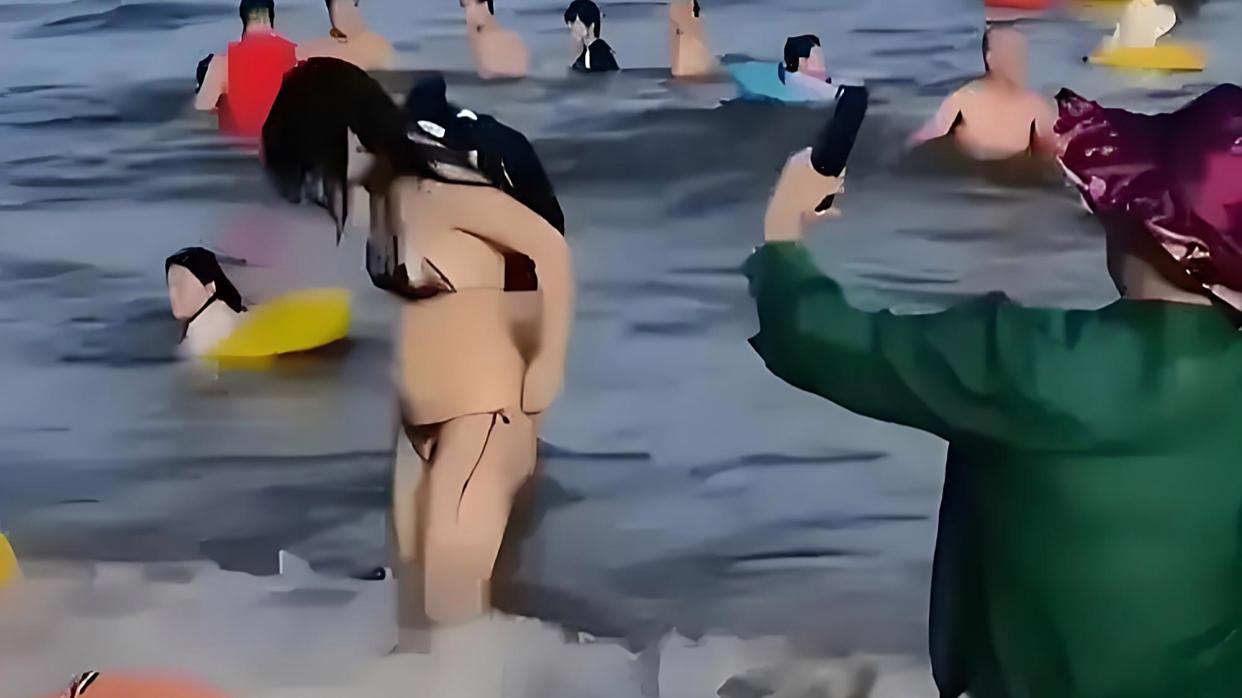三亚辟谣:女子比基尼被冲走教练帮遮
