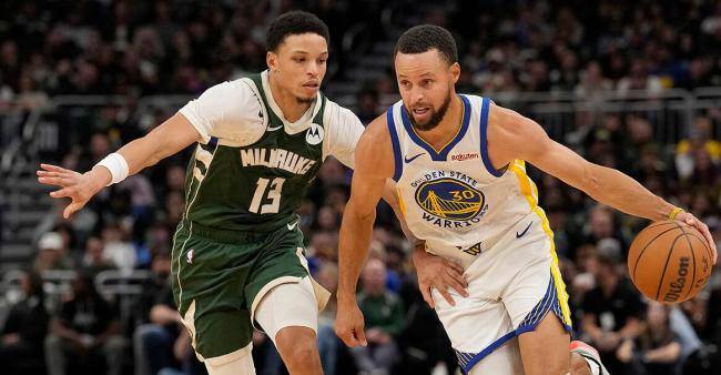 雄鹿战胜勇士 关键三分锁定胜局