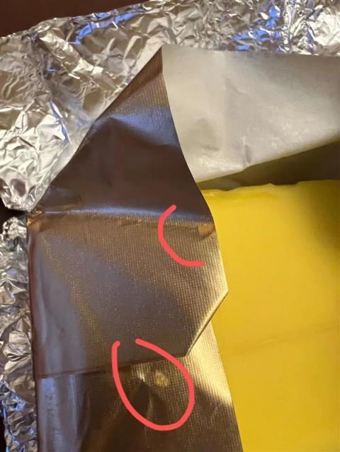 是谁给黄油块包得整整齐齐(图1)